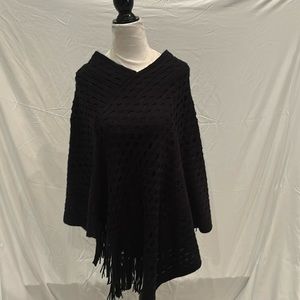 INC black poncho with fringe trim